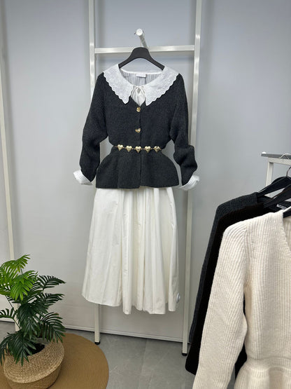 Bel oturtmalı, peplum etekli, V yaka, uzun kollu triko kazak